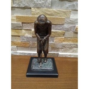 Bronze golf statue